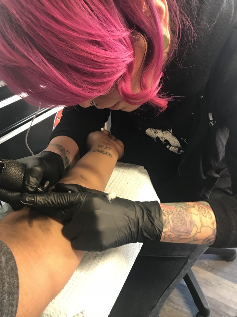 Tattoo being applied